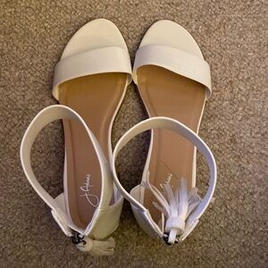 White sandal with tassel